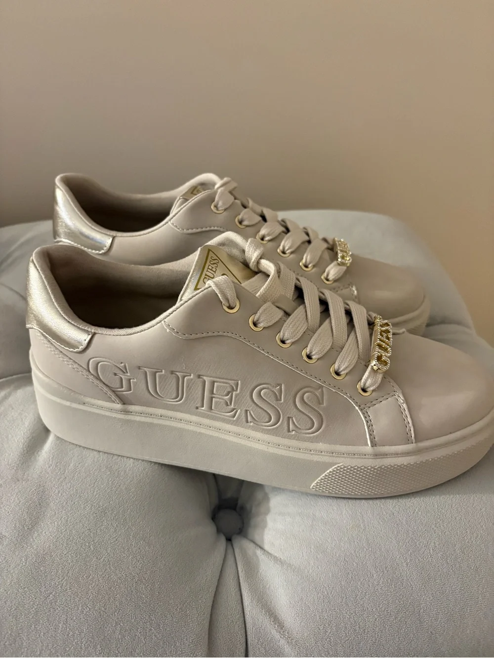 GUESS Cream Platform Sneakers with Gold Accents